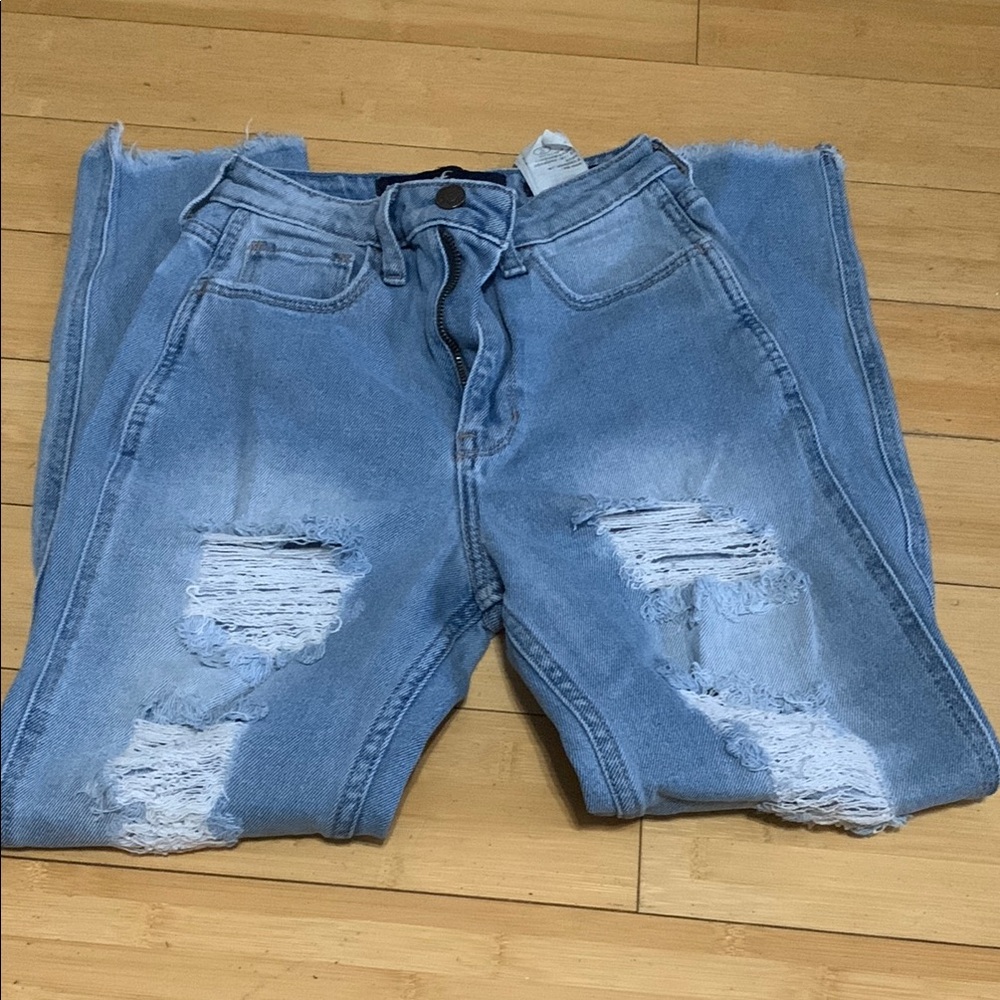 Distressed Light Blue Jeans